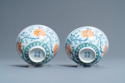 A pair of Chinese doucai bowls, four-character mark, 20th C.