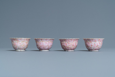 Four Chinese lotus-moulded famille rose cups and saucers with squirrels, Yongzheng
