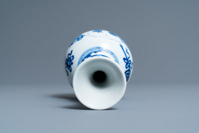 A Chinese blue and white triple gourd 'antiquities' vase, Kangxi