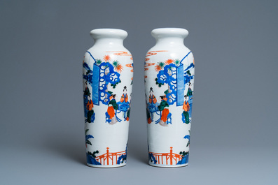 A pair of Chinese wucai rouleau vases, 19th C.