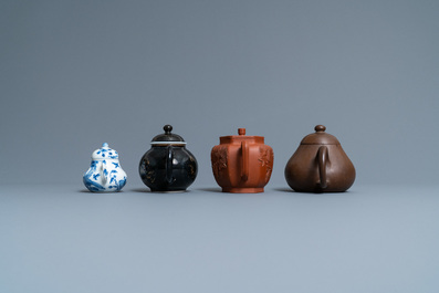 Four Chinese Yixing stoneware, blue and white and monochrome black porcelain teapots, Kangxi and later