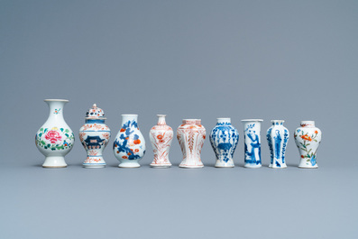 Ten mostly Chinese blue and white, famille rose and Imari-style vases, Kangxi and later