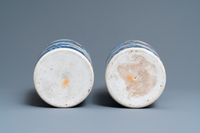 A pair of Chinese wucai rouleau vases, 19th C.