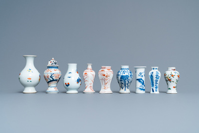 Ten mostly Chinese blue and white, famille rose and Imari-style vases, Kangxi and later