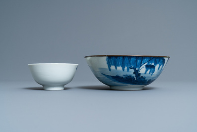 Three Chinese blue and white 'Bleu de Hue' plates and two bowls for the Vietnamese market, 19th C.
