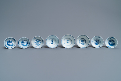 Eight Chinese blue and white cups and five saucers, Kangxi