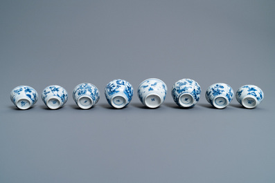 Eight Chinese blue and white cups and five saucers, Kangxi