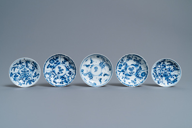 Eight Chinese blue and white cups and five saucers, Kangxi