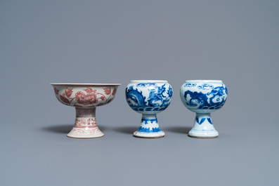A pair of Chinese blue and white 'dragon' stem cups and one in copper-red, 19/20th C.