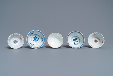 Five various Chinese cups and saucers and a small dish, Kangxi/Qianlong