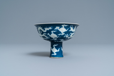 A Chinese blue-ground incised 'dragon' stem cup, Xuande mark, Republic