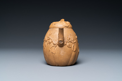 A Chinese Yixing stoneware teapot with squirrels and butterflies, seal mark, 18th C.