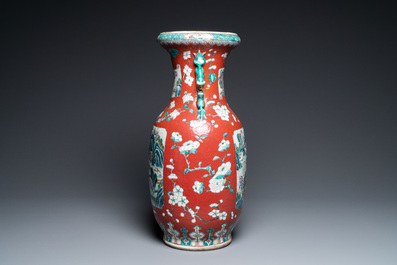 A Chinese famille rose ruby-ground vase, 19th C.