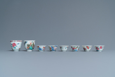 Eight Chinese famille rose and verte cups and saucers, Kangxi/Qianlong