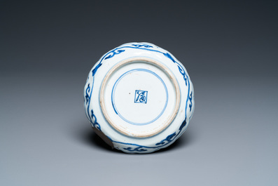 A Chinese blue and white shonzui ko-sometsuke dish with birds and calligraphy, Chongzhen
