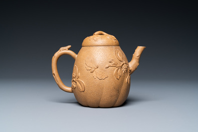 A Chinese Yixing stoneware teapot with squirrels and butterflies, seal mark, 18th C.