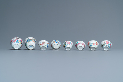 Eight Chinese famille rose and verte cups and saucers, Kangxi/Qianlong