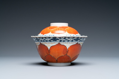 A Chinese iron-red, gilt and blue and white covered bowl on stand, 19th C.