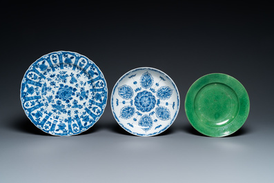 Two Chinese blue and white dishes and a green monochrome plate, Kangxi