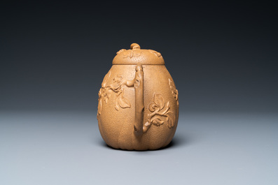 A Chinese Yixing stoneware teapot with squirrels and butterflies, seal mark, 18th C.