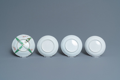 Eight Chinese famille rose and verte cups and saucers, Kangxi/Qianlong