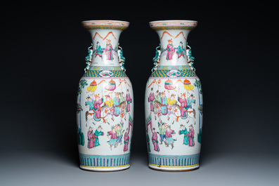 A pair of Chinese famille rose vases with temple scenes, 19th C.