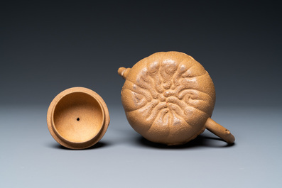 A Chinese Yixing stoneware teapot with squirrels and butterflies, seal mark, 18th C.