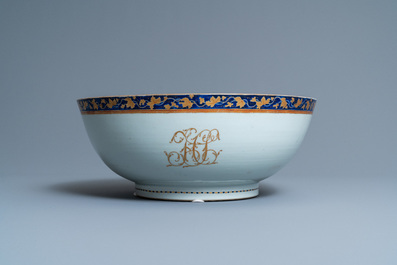 A large Chinese monogrammed export porcelain punchbowl and dish, Qianlong