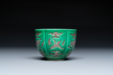 A Chinese aubergine- and green-glazed 'cranes' wine cup, 19/20th C.