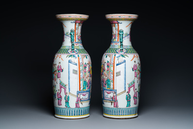 A pair of Chinese famille rose vases with temple scenes, 19th C.