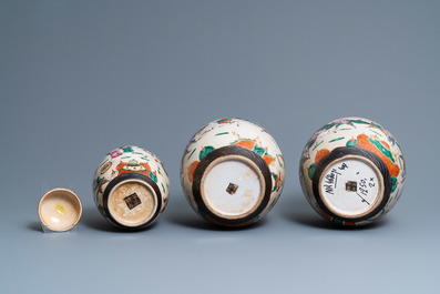 A pair of Chinese famille rose Nanking crackle-glazed jars and a jar with cover, 19th C.