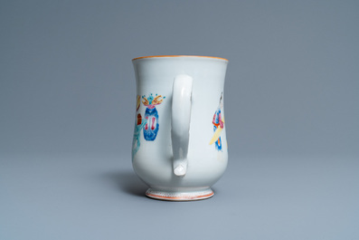 A pair of Chinese famille rose bowls on gilt bronze stand and a 'mandarin' mug, Qianlong