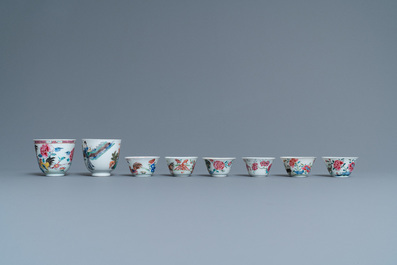 Eight Chinese famille rose and verte cups and saucers, Kangxi/Qianlong