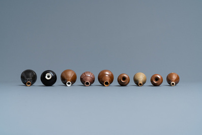 Thirty-eight Chinese blue and white, famille rose and monochrome miniature vases, Kangxi/Qianlong