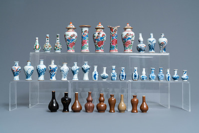 Thirty-eight Chinese blue and white, famille rose and monochrome miniature vases, Kangxi/Qianlong