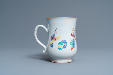 A pair of Chinese famille rose bowls on gilt bronze stand and a 'mandarin' mug, Qianlong