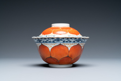A Chinese iron-red, gilt and blue and white covered bowl on stand, 19th C.
