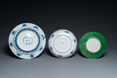 Two Chinese blue and white dishes and a green monochrome plate, Kangxi