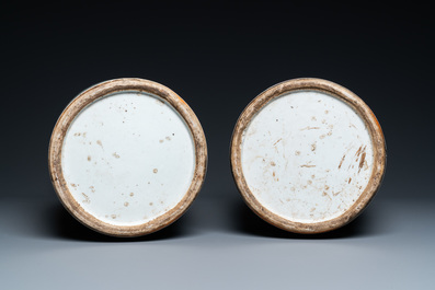 A pair of Chinese famille rose vases with temple scenes, 19th C.