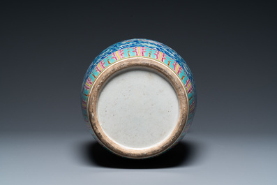 A Chinese famille rose blue-ground 'bajixiang' vase, 19th C.