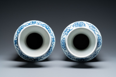 A pair of Chinese blue and white 'peacock' vases, Qianlong mark, 20th C.