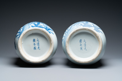 A pair of Chinese blue and white 'peacock' vases, Qianlong mark, 20th C.