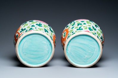 A pair of Chinese famille rose 'dragon and phoenix' vases, 19th C.