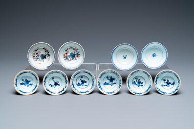 Twenty-two Chinese blue and white and famille rose cups and nineteen saucers, Kangxi and later