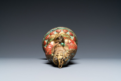 A Chinese champlev&eacute; enamel and gilt copper figure of Guanyin, Qing
