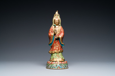 A Chinese champlev&eacute; enamel and gilt copper figure of Guanyin, Qing