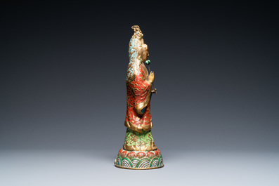 A Chinese champlev&eacute; enamel and gilt copper figure of Guanyin, Qing