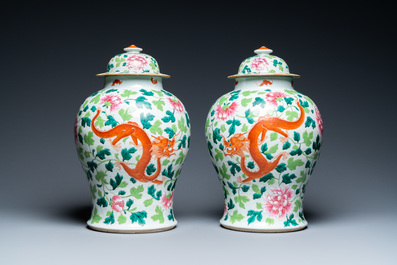 A pair of Chinese famille rose 'dragon and phoenix' vases, 19th C.
