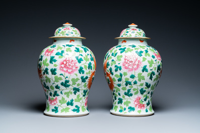 A pair of Chinese famille rose 'dragon and phoenix' vases, 19th C.