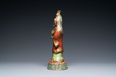 A Chinese champlev&eacute; enamel and gilt copper figure of Guanyin, Qing